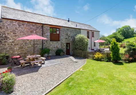The patio, alfresco dining area & garden at Bracken Cottage, Lower Treslea Farm, Treslea