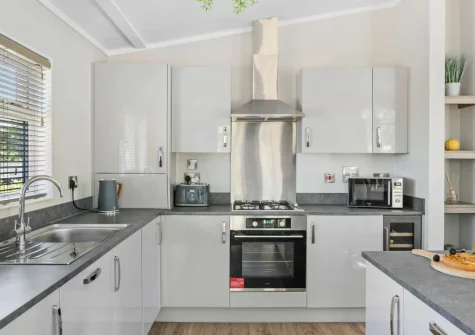 The kitchen at Bramble Lodge, 12 Roadford Lake Lodges, Broadwoodwidger