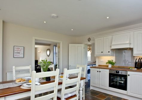 The kitchen & dining area at Brambles Cottage, Wooda Farm, Bush