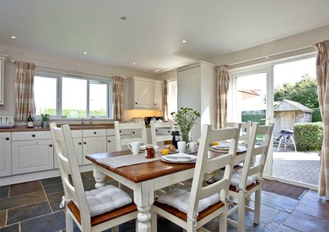 The kitchen & dining area at Brambles Cottage, Wooda Farm, Bush