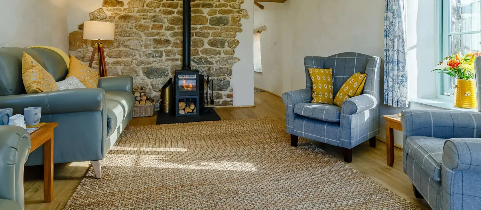 Bread Barn At Pengelly Farm, Nancegollan is a stylish reverse-level barn conversion on a working Cornish farm. With three elegant bedrooms, wood burner, enclosed garden, and panoramic countryside views, it's ideally situated for exploring Cornwall.