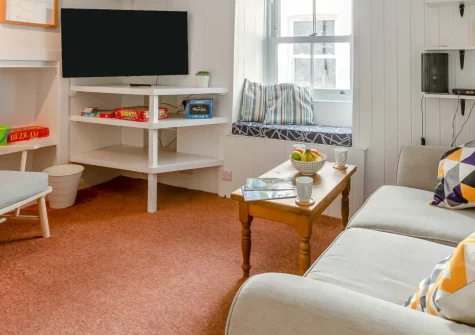 Breton Cottage, St Ives is a characterful two-bedroom retreat in the heart of this celebrated coastal town, featuring charming original features, bright coastal interiors, and a prime position just steps from Harbour Beach and the town centre.
