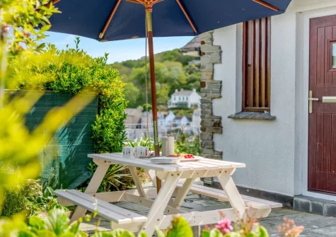 The patio & alfresco dining area at Briar Rose, Polruan