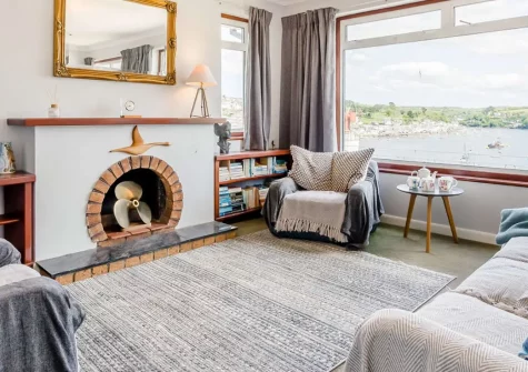 Briar Rose, Polruan is a spacious dog-friendly cottage with stunning waterside views overlooking Fowey. Enjoy traditional charm, enclosed garden with dog wash facilities, and easy access to Cornwall's golden beaches, coastal paths, and attractions.