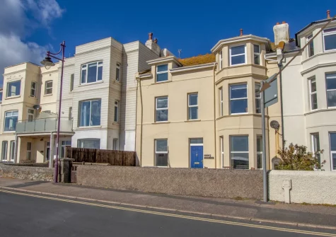 Brixham View is a seaside apartment, classically decorated with antique-style furnishings & period features