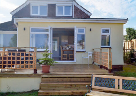 The decked patio & garden at Broadsands Retreat, Goodrington