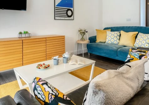 Brynor, Widemouth Bay is a spacious three-bedroom bungalow just half a mile from the golden sands of Widemouth Bay beach, featuring a sunny conservatory, generous garden with barbecue, and easy access to North Cornwall's stunning coastline.