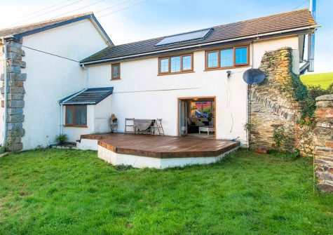 The decked patio & garden at Bubble Cottage, Watergate Bay