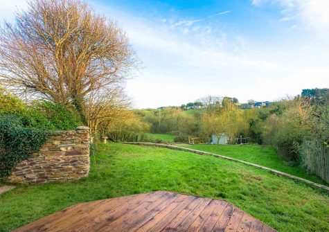 The decked patio & garden at Bubble Cottage, Watergate Bay
