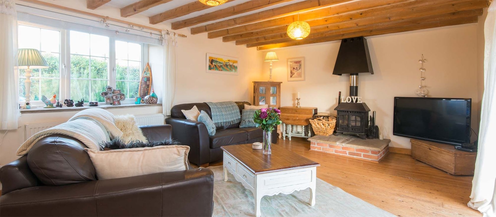 Bubble Cottage, Watergate Bay is a three bedroom converted farm cottage with woodburner in countryside minutes from the sand & surf at Watergate Bay. Ideal for six, it has luxurious kitchen, open plan living room with woodburner, outdoor deck & parking.
