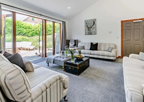 The living room at Buckland Barn, Buckland Brewer