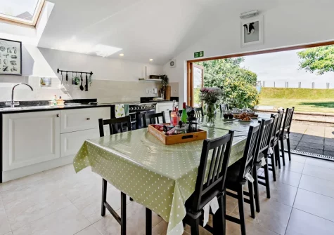 The kitchen & dining area at Buckland Barn, Buckland Brewer