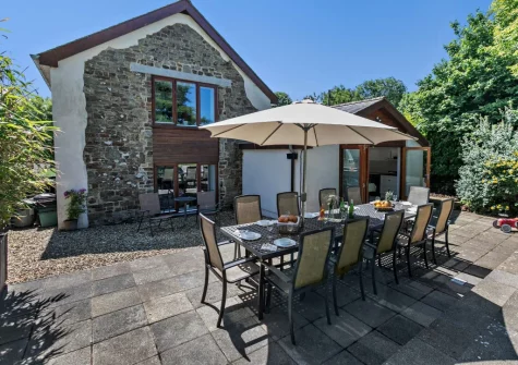 The patio & alfresco dining area at Buckland Barn, Buckland Brewer