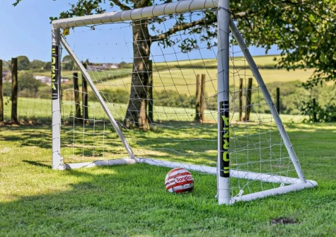 The large enclosed lawned garden at Buckland Barn, Buckland Brewer