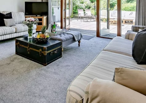 Buckland Barn, Buckland Brewer is an exceptional eight-bedroom barn conversion ideal for families and groups. Enjoy dual patios, games shed, playground gardens, and the perfect countryside base for creating unforgettable holiday memories together.