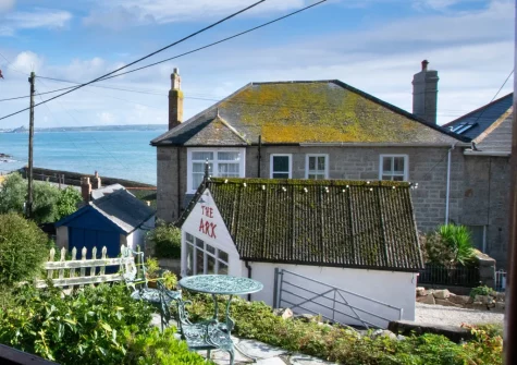 The front patio, outdoor sitting area & garden at Bumbles, Mousehole