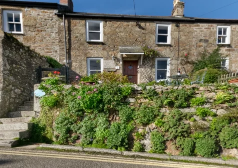 Bumbles is a characterful three-bedroom granite Cornish cottage located in the fishing port village of Mousehole