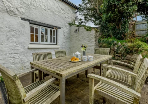 The patio & alfresco dining area at Burrows Farmhouse, Croyde