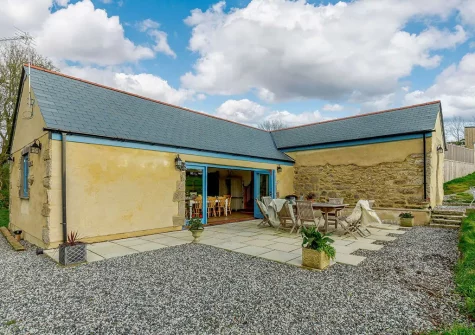 The patio & alfresco dining area at Butter Barn At Pengelly Farm, Nancegollan