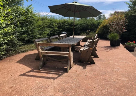 The patio, barbecue & alfresco dining area at Buzzard Cottage, Sheldon
