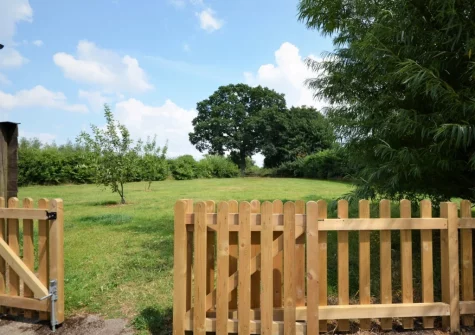 The enclosed lawned garden at Buzzard Cottage, Sheldon