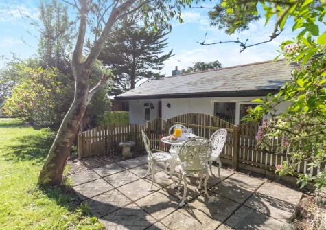 The terrace, babrecue, alfresco dining area & lawned garden at Buzzards Cottage, Redruth