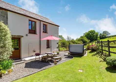The barbecue, alfresco dining area & garden at Buzzards Reach, Lower Treslea Farm, Treslea