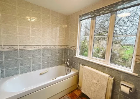 Bedroom #3 en-suite bathroom at Byre Cottage, Bagbeare, Thornbury