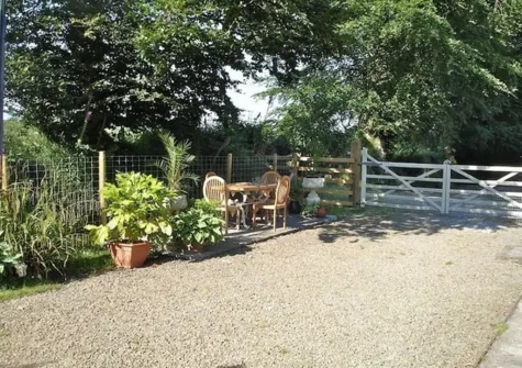 The outdoor sitting area at Byre Cottage, Bagbeare, Thornbury