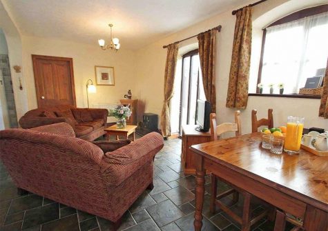 The open-plan living area at Byre Cottage, Bridge