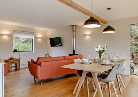 The living & dining area at Cabana Lakeside Lodge 4, Whitnage