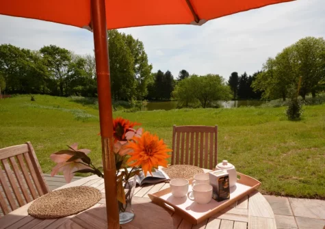 The patio & alfresco dining area at Cabana Lakeside Lodge 4, Whitnage
