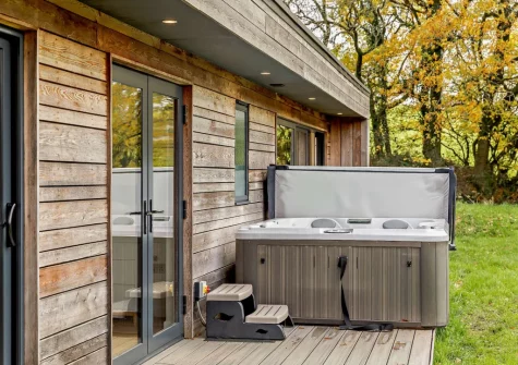 The decked terrace & hot tub at Cabana Lakeside Lodge 4, Whitnage