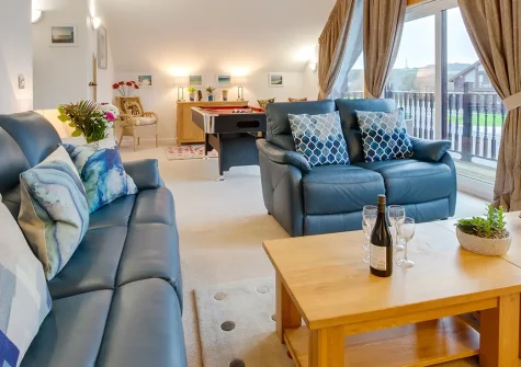 Calypso is a magnificent Scandinavian-style lodge at Retallack Resort & Spa, sleeping eight guests in luxury. Enjoy vaulted ceilings, panoramic views, a pool table, and direct access to resort activities. Perfect for unforgettable family gatherings.