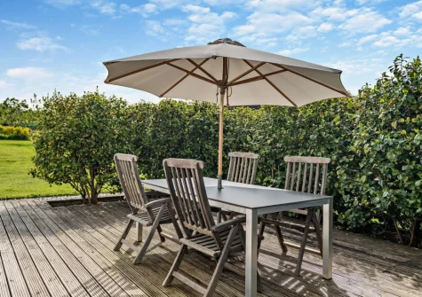 The decked patio & alfresco dining area at Camellia Cottage In The Tamar Valley, Bere Alston