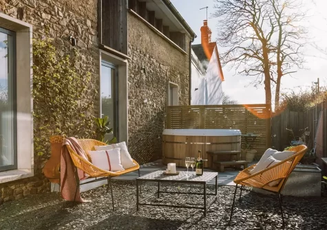 The patio & hot tub at Campion Barn, Venn Farm, Pancrasweek