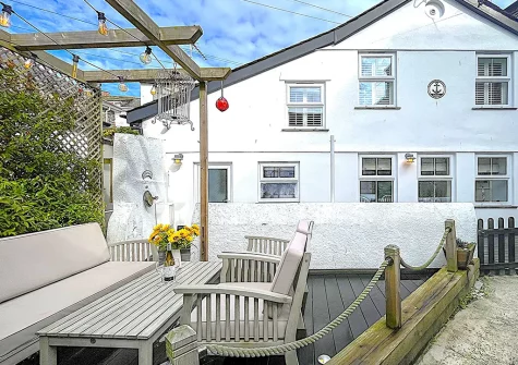 The decked courtyard & alfresco dining area at Captains Cottage, Padstow