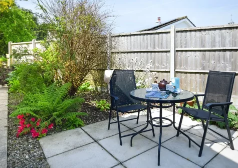 The garden patio & outdoor sitting area at Carew Villa, St Day
