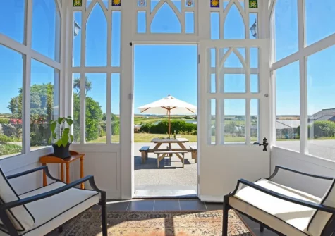 A relaxed sitting area at Carnevas Farmhouse, Porthcothan