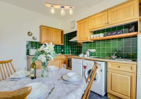 The kitchen & dining area at Carnevas Farmhouse, Porthcothan