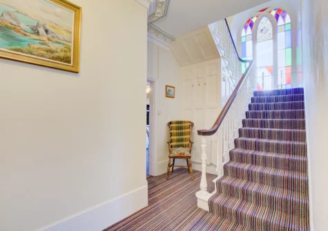 the stairs up to the first floor at Carnevas Farmhouse, Porthcothan