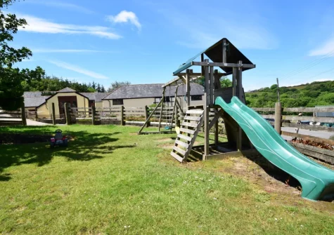 The shared children's play area at Cart Linhay Cottage, Bittadon