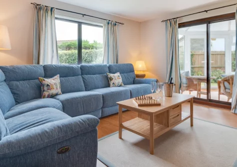 Castaways, St Merryn is a light-filled three-bedroom house in the heart of North Cornwall's Seven Bays, featuring a sunny conservatory with table tennis, enclosed garden, and easy access to seven spectacular beaches within four miles.