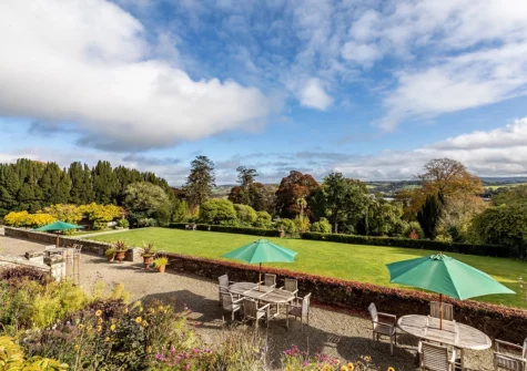 The patio & garden at Castle By The Water, Paynter's Cross