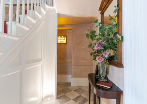 The hallway & stairs up to the first floor at Castle Lodge, Truro