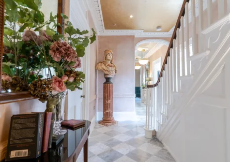 The hallway & stairs up to the first floor at Castle Lodge, Truro