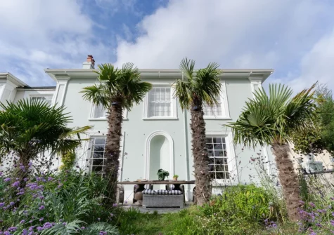 The terrace, alfresco dining area & tiered Mediterranean garden at Castle Lodge, Truro