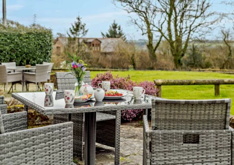 The patio & alfresco dining area at Cedar Cottage, Woolsery