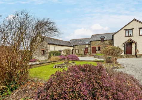 Cedar Cottage is set within an idyllic courtyard with wildlife ponds & an expansive garden