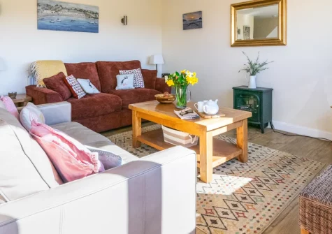 Cedar, Goldenbank is a beautifully updated barn conversion in peaceful Falmouth farmyard, featuring characterful accommodation with countryside views, an enclosed garden overlooking the golf club, and two gorgeous beaches within walking distance.